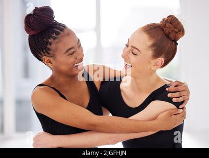 Youre always be in my heart. two ballet dancers hugging. Stock Photo