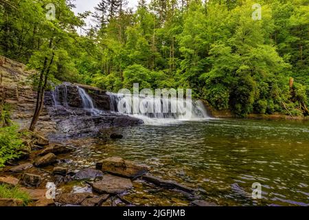 Hooker Falls is one of  four major waterfalls on the Little River in North Carolina's Dupont Forest. Stock Photo