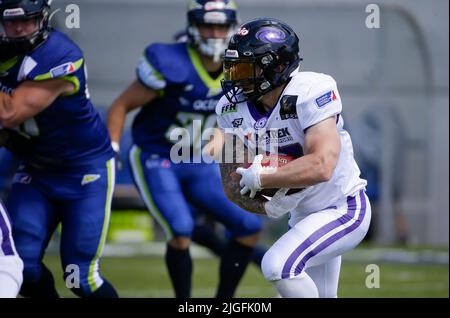 Waldau, Germany. 10th July, 2022. Frankfurt Galaxy RB #27 Thomas Fischbach runs with the ball during a European League of Football game between the Stuttgart Surge and the Frankfurt Galaxy at GAZi Stadium in Waldau, Germany. Justin Cooper/CSM/Alamy Live News Stock Photo