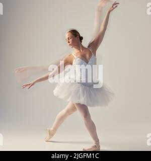 Dreaming on my feet. Full of a beautiful young ballet dancer rehearsing in a dance studio. Stock Photo