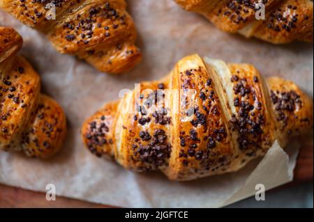 Freshly baked chocolate croissants Stock Photo