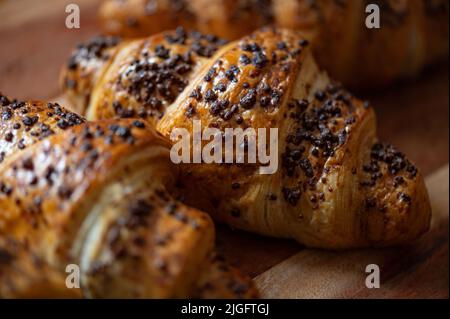Freshly baked chocolate croissants Stock Photo