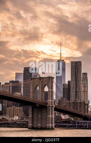 Brooklyn Bridge, New York, USA. Perspective view of the bridge taken from the river below Stock Photo