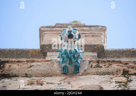 Porcelain gargoyle of Palace of Weathervanes, Caceres historic quarter, Extremadura, Spain Stock Photo