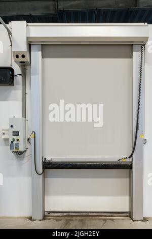 High speed door in a industrial building Stock Photo