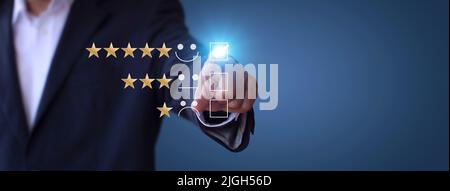 Businessman touching the virtual screen check mark joyful Smile face icon to give happiness in service. Customer service and satisfaction concept. Ver Stock Photo
