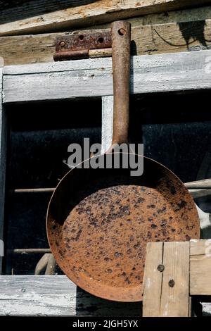 Old, rusty, cast-iron pan for baking cornbread sticks in the shape of corn  on the cob isolated against a white background Stock Photo - Alamy