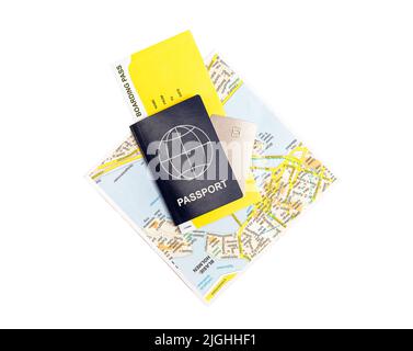 Passport, boarding pass, credit card and tourist map isolated on white background. Necessary items for trip. Travelling, tourism concept. High quality photo Stock Photo