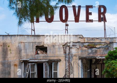 Famagusta, Cyprus - April 20, 2022: Street view of abandoned Hoover agency building in the ghost city of Varosha, Famagusta Stock Photo