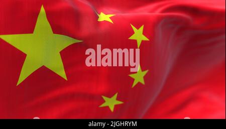 Close-up view of the Chinese national flag waving in the wind. China is a country in East Asia Stock Photo