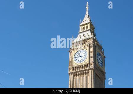 Big Ben clock tower close up in London on the blue sky. Symbol of London, United Kingdom Stock Photo