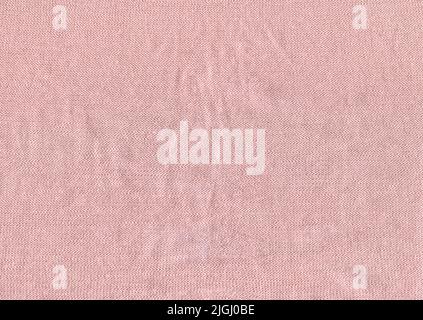 Warm cerise colored knitted wool background. Beautiful knitted carnation wool textiles as a background. Stock Photo