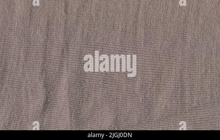 Winter  taupe grey simple fabric wool scarf pattern. Stone grey colored wool sweater texture. Stock Photo