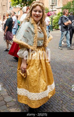 Girl from The Night Watch painting at the Reenactment festival of Rembrandt van Rijn, his paintings and era, Leiden, South Holland, Netherlands. Stock Photo