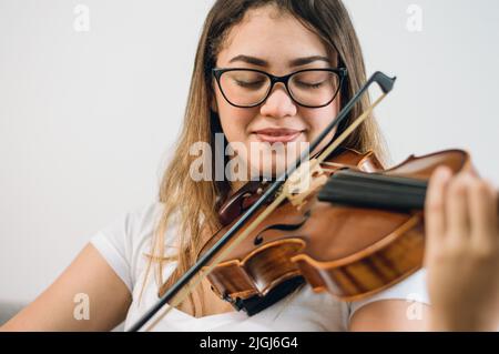 close up portrait of young latin female violinist Stock Photo