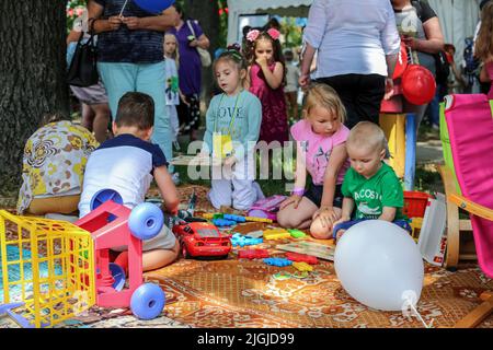 Odessa, Ukraine. 31st May, 2022. Children are seen playing with each other at the children's party in Odessa People's Church. In connection with the military actions of the Russian Federation, there are many internally displaced people in Odessa. Children's holiday was organized for them and their children. (Photo by Viacheslav Onyshchenko/SOPA Images/Sipa USA) Credit: Sipa USA/Alamy Live News Stock Photo