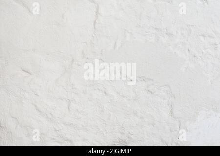 Close-up of white plastered wall background. Stock Photo