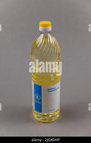 A bottle of refined sunflower oil. World Food Program logo on the bottle. Humanitarian aid to residents of Ukraine during the Russian aggression in 20 Stock Photo