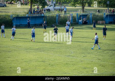 Zagreb, Croatia-May 22nd, 2022: Sunday league football players on the field, playing the soccer match Stock Photo