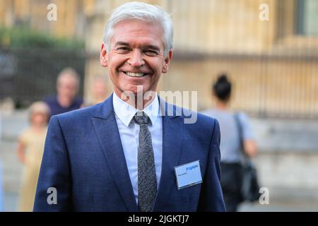 London, UK. 11th July, 2022. Phillip Schofield, TV presenter, smiles in Westminster this evening after attending an event at the Houses of Parliament. Credit: Imageplotter/Alamy Live News Stock Photo