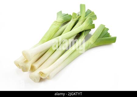 Bunch of homegrown leeks isolated on white background Stock Photo - Alamy