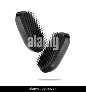 Two detangler hairbrushes float on white. A combs for detangling and caring for hair and scalp in the air. Accessory for a lather shampoo and headskin Stock Photo