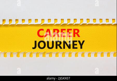 Career journey symbol. Concept words Career journey on yellow paper on a beautiful white background. Business Career journey concept. Copy space. Stock Photo