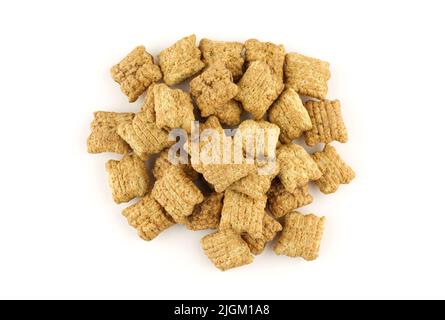 Cereals filled with delicious chocolate .Pillows made with whole grains and isolated on white background Stock Photo