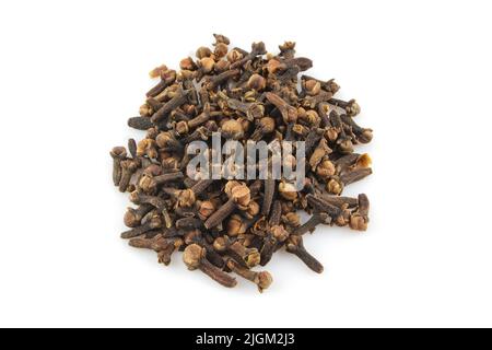 Pile of dried flower buds isolated on white background. Clove (Syzygium aromaticum) Stock Photo