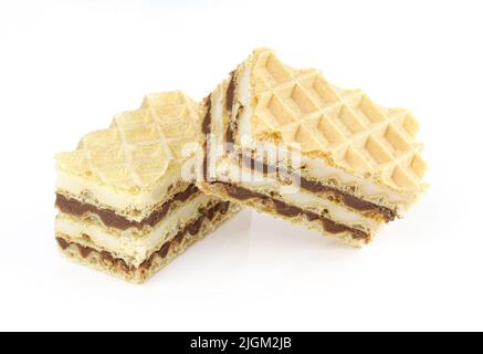 Four layers of vanilla and chocolate cream in 2 pieces of homemade oblate dessert Stock Photo
