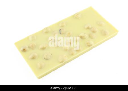 White chocolate bar with hazelnuts isolated on white background Stock Photo