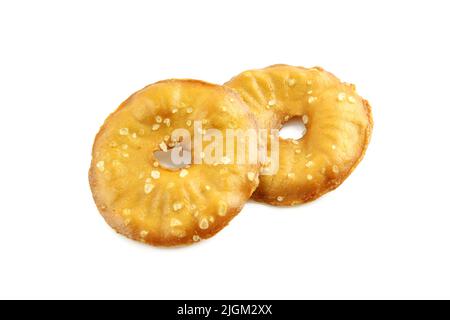 Cracker chips with sea salt isolated on white background. Round shape appetizers Stock Photo