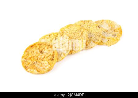 Stack of thin corn rice cracker chips isolated on white background. Healthy dietetic food Stock Photo