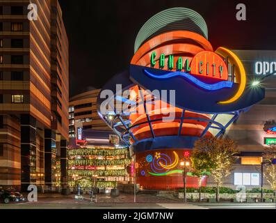 fukuoka, kyushu - december 06 2021: Giant neon sign at night depicting the logo of the multifunctional complex facility Canal City Hakata mall with sh Stock Photo