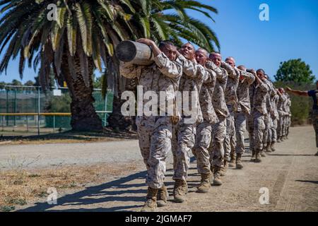 San Diego, California, USA. 27th June, 2022. U.S. Marine Corps recruits with Mike Company, 3rd Recruit Training Battalion, carry logs during log drills at Marine Corps Recruit Depot San Diego, June 27, 2022. Recruits carried a 250 pound log, executing various exercises to strengthen their bodies, minds, and teamwork. Credit: U.S. Marines/ZUMA Press Wire Service/ZUMAPRESS.com/Alamy Live News Stock Photo