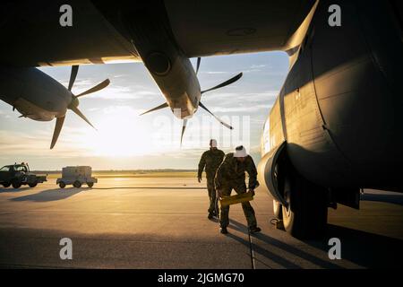 June 9, 2022 - Alpena, Michigan, USA - U.S. Air Force Staff Sgt. Danny Johnston and Master Sgt. Justin King, C-130 Loadmasters from 130th Airlift Wing, McLaughlin Air National Guard Base, Charleston, West Virginia, perform a precheck on C-130J Hercules aircraft on the flightline during Agile Rage 22 at Alpena Combat Readiness Training Center in Alpena, Mich., June 9, 2022. Agile Rage 22 is a National Guard Bureau-led exercise that provides realistic training opportunities, mimicking current and future combat environments dictated by the National Defense Strategy. (Credit Image: © U.S. National Stock Photo