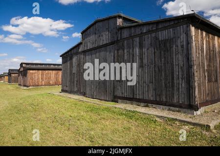 Dormitory buildings inside the Auschwitz II-Birkenau former Nazi Concentration Camp, Auschwitz-Birkenau, Poland. Stock Photo