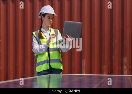 young caucasian woman university student learning and experimental to set up programing solar cell renewable energy in engineering, bachelor of scienc Stock Photo