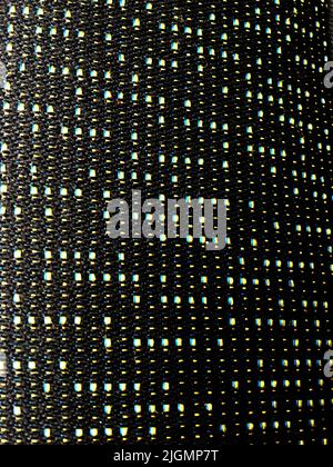 Dark industrial carbon fiber style woven textile texture Stock Photo
