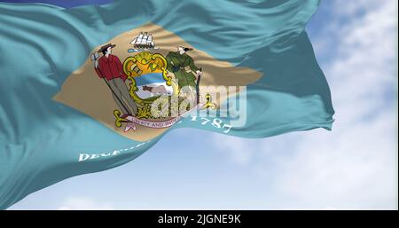 The state flag of Delaware waving in the wind on a clear day. Delaware is a state in the Mid-Atlantic region of the United States. Democracy and indep Stock Photo