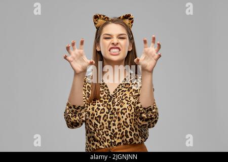 happy woman in halloween costume of leopard Stock Photo