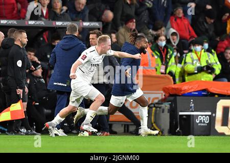 Boreham Wood players celebrate at full time with a replica FA Cup - AFC Bournemouth v Boreham Wood, The Emirates FA Cup fourth round, Vitality Stadium, Bournemouth, UK - 6th February 2022  Editorial Use Only - DataCo restrictions apply Stock Photo