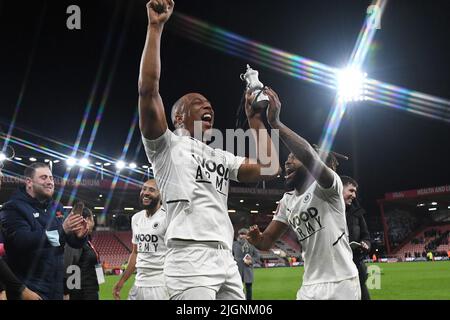 Boreham Wood players celebrate at full time with a miniature FA Cup - AFC Bournemouth v Boreham Wood, The Emirates FA Cup fourth round, Vitality Stadium, Bournemouth, UK - 6th February 2022  Editorial Use Only - DataCo restrictions apply Stock Photo