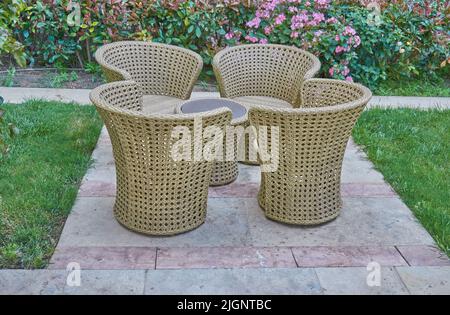 Garden rattan furniture in near plan Stock Photo