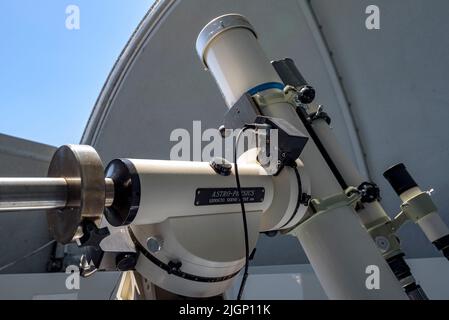 Salvador Ribas, the director of the Universe Observation Center, maneuvering a telescope at the Montsec Astronomical Park, in Àger (Lleida, Catalonia) Stock Photo