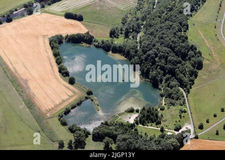 aerial vierw of Tanfield Lodge Lake, a fish farm or fishing lake near West Tanfield, North Yorkshire Stock Photo