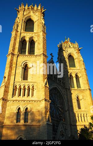 The stone French Gothic Cathedral Basilica of the Sacred Heart is the seat of the Roman Catholic church and religion of the Archdiocese of Newark NJ Stock Photo