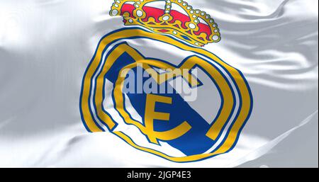 Madrid, Spain, May 2022: The flag of Real Madrid Club de Futbol waving in the wind on a clear day. Real Madrid C.F. is a Spanish professional football Stock Photo