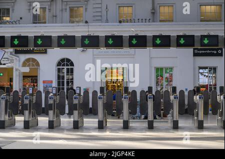 Ticket barriers at Brighton Railway Station, England. Stock Photo