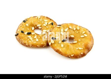Two round cracker with sesame seeds isolated on white background Stock Photo